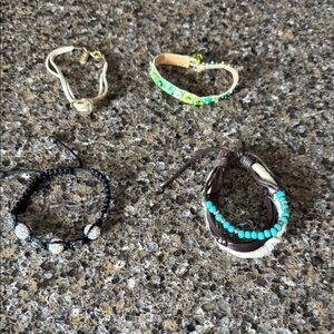 Set of Four Bracelets - at least 1 AERO bracelet - 2 adjustable from small-large